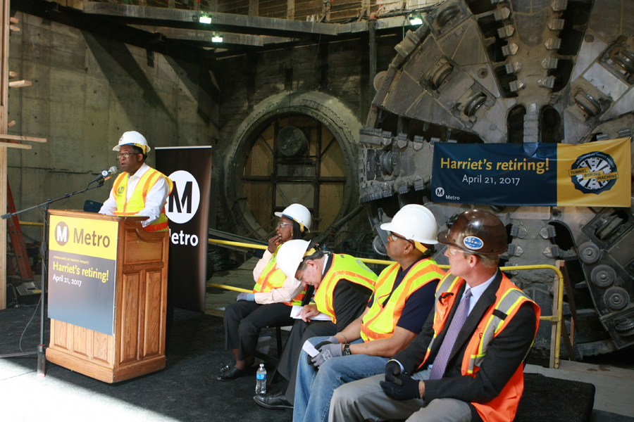 Supervisor Mark Ridley-Thomas, standing in front of the tunnel boring machine, addresses a crowd six stories below Crenshaw Blvd. Photos by Jason Lewis